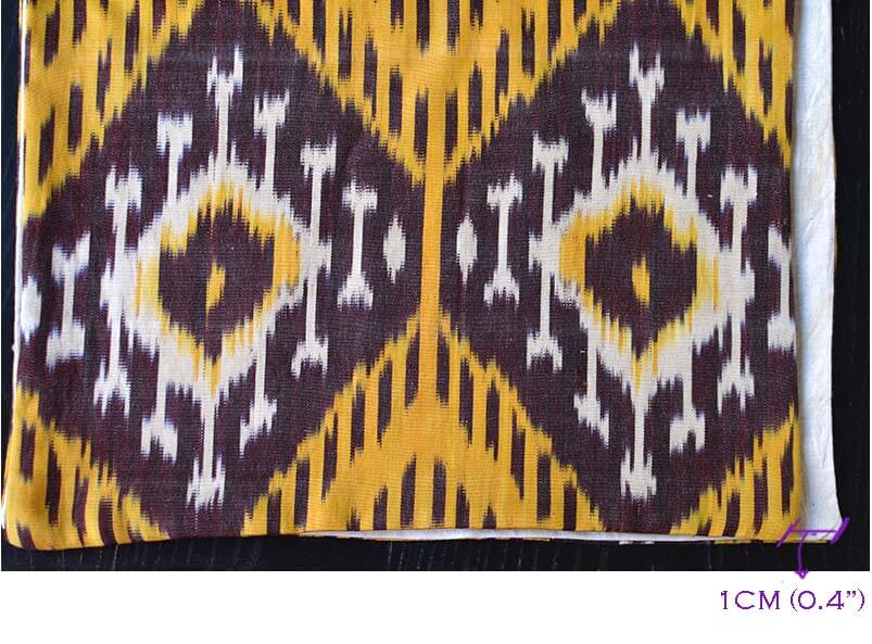 Yellow, brown and white ikat table runner - differences in widths