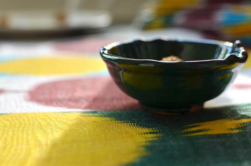 Fruity and Juicy ikat fabric with a ceramic bowl